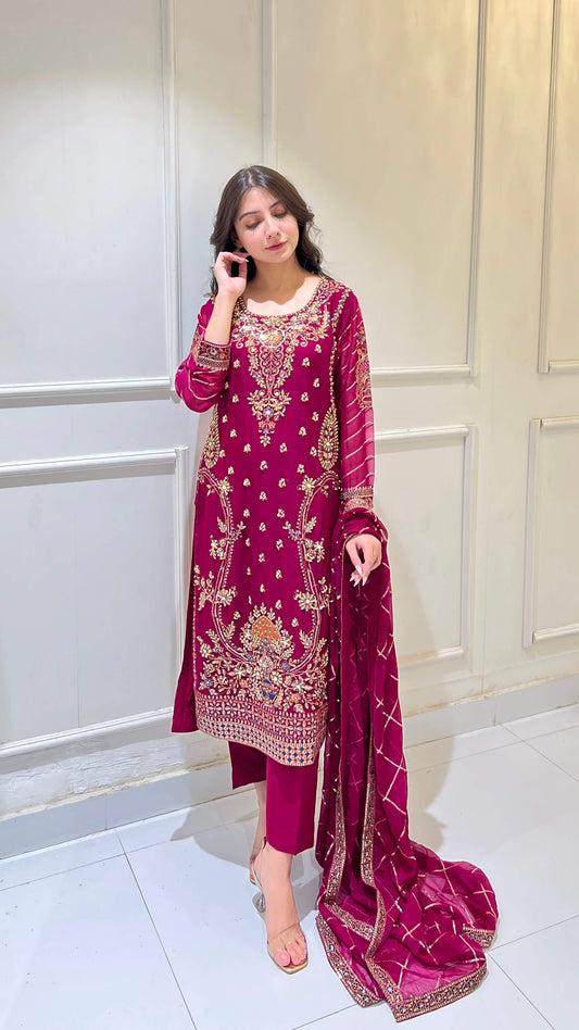 Woman wearing premium chiffon embroidered shalwar kameez with dupatta – front view