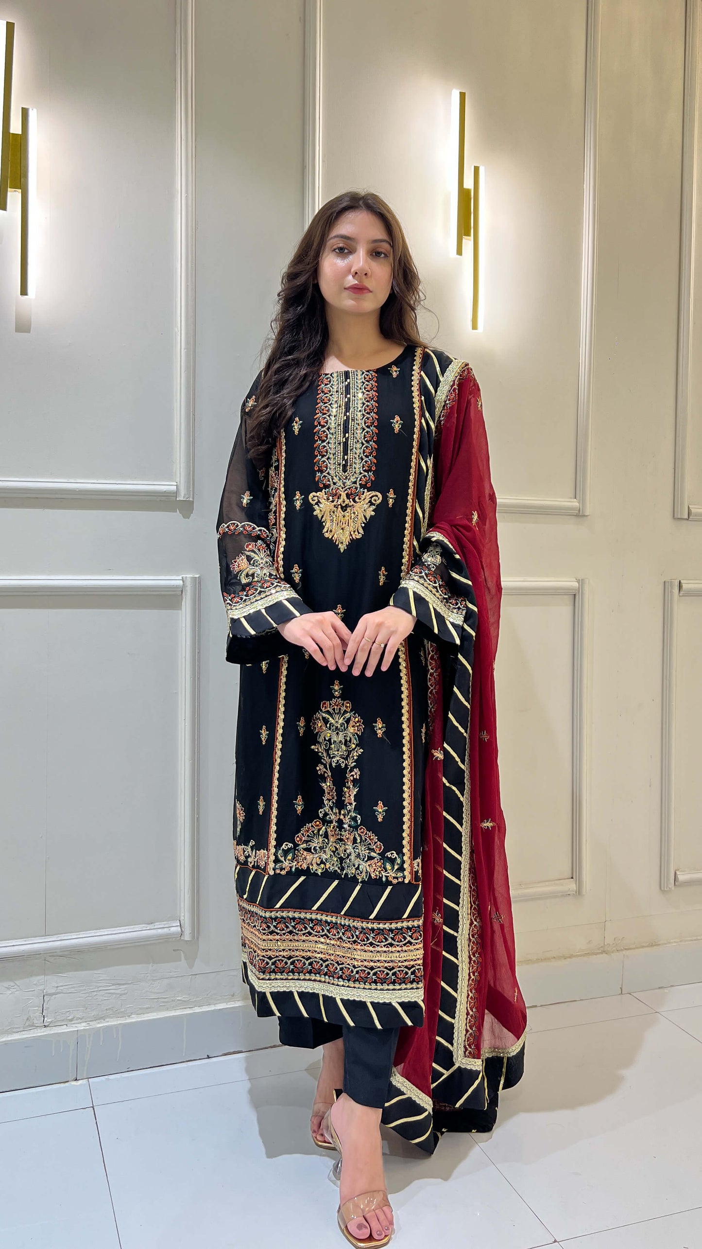 Black chiffon shirt and trouser with matching maroon dupatta draped over shoulder