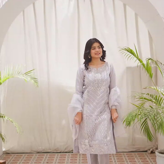 Woman wearing a lilac outfit video